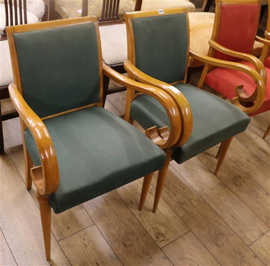 A pair of stylish 1940s beechwood elbow chairs